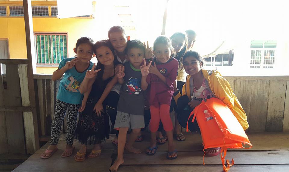 Jahnavi with kids at longhouse